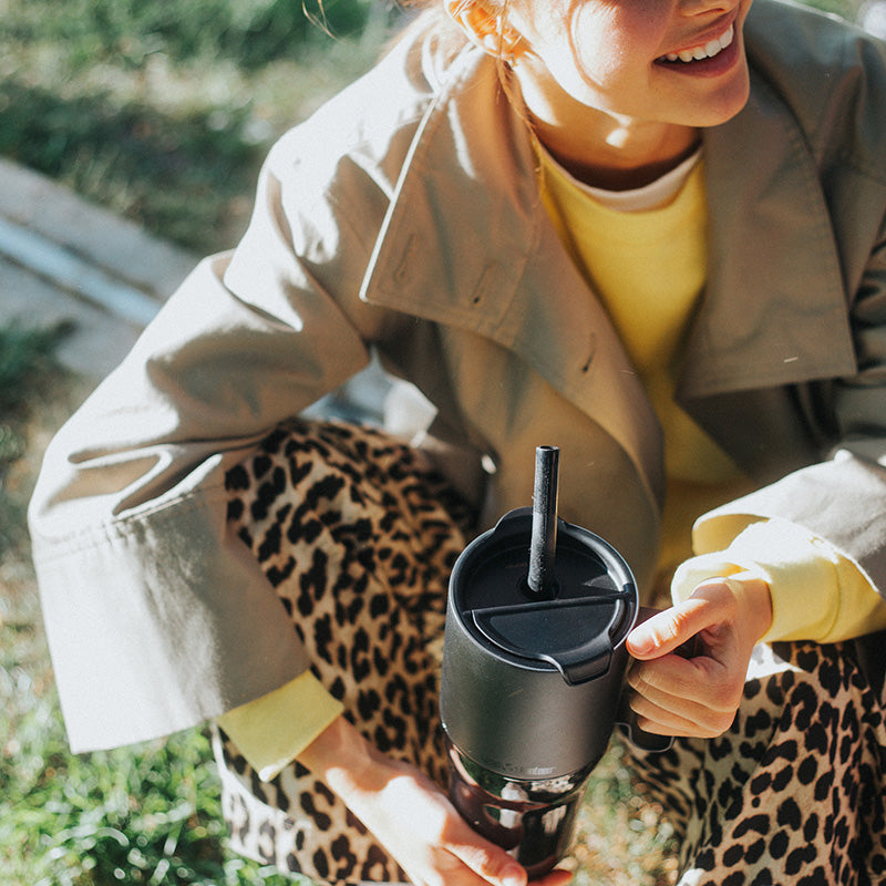 26oz-rise-tumbler-with-straw-lid-s6 26oz_rise_tumbler_black_woman_topview_square.jpg