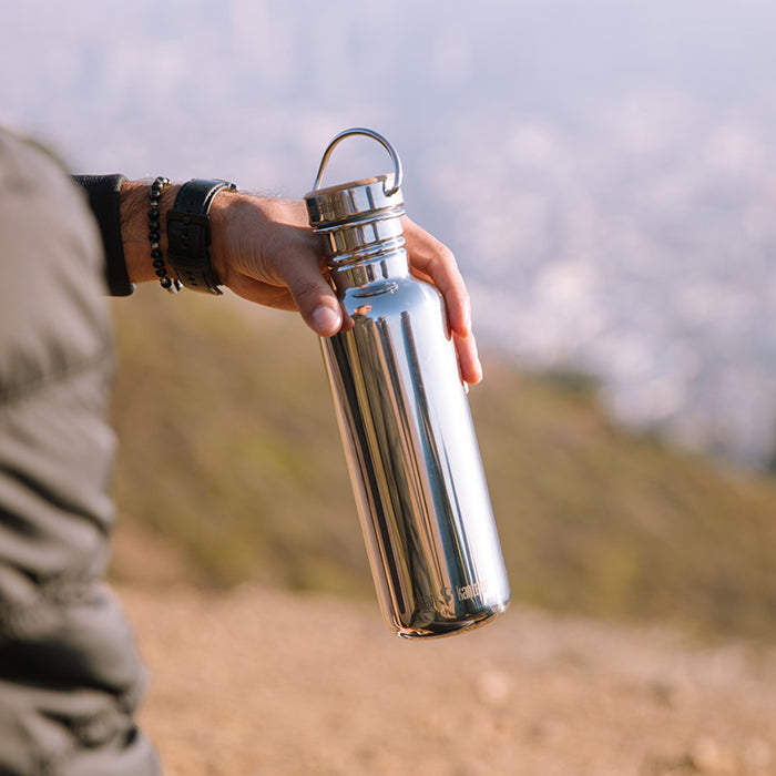 27oz-reflect-with-bamboo-cap-q4 K27SSLRF-MS-BAMBOO_reflect_bottle_hand_lifestyle.jpg