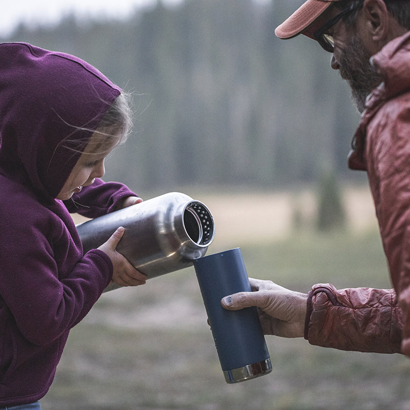 64oz-tkwide-with-loop-cap-x3 tkwide_64oz_bottle_girl_dad_filling_square.jpg